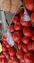 tomatoes and other fresh produce at the farmers market.